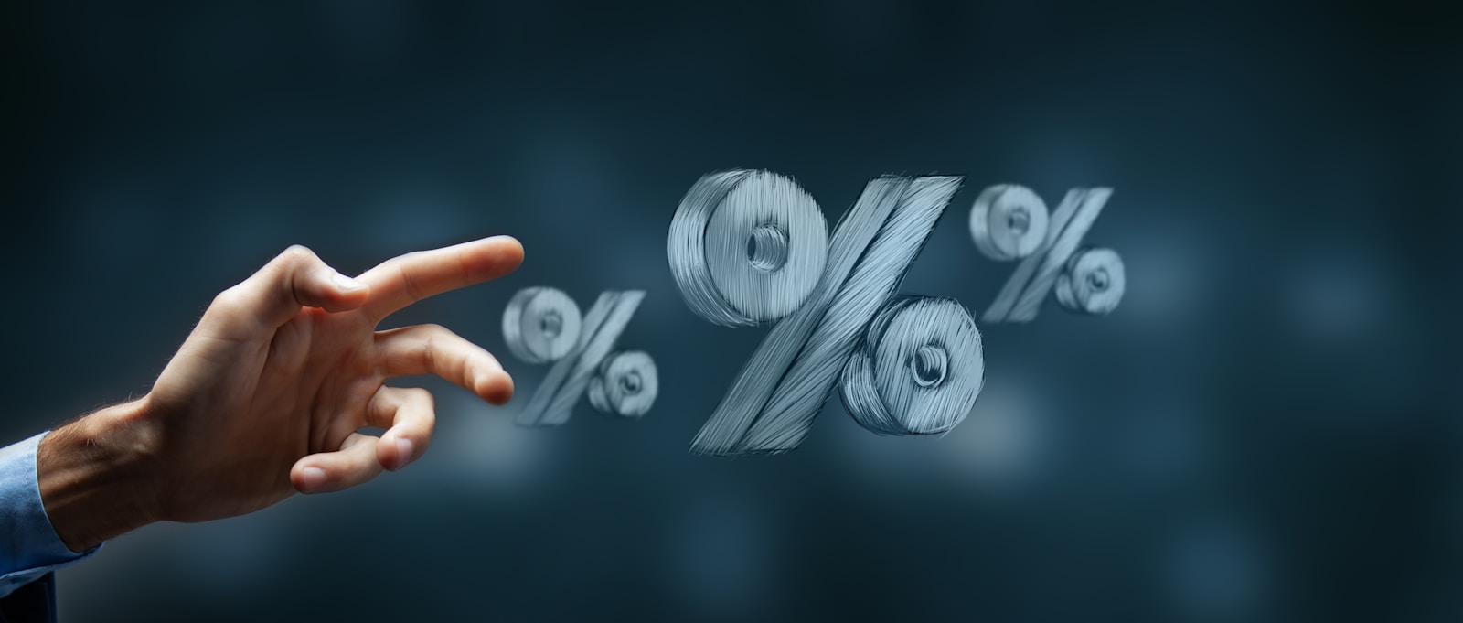 Hand reaching towards floating percentage symbols.